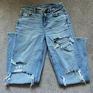 Womens light washed ripped jeans